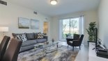 Condo rentals in Orlando, check out the Great room with comfortable seating and direct access onto lanai