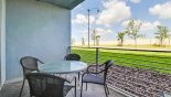 Lanai with patio table & 4 chairs to enjoy open views with this Orlando Condo for rent direct from owner