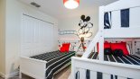 Spacious rental Champions Gate Townhouse in Orlando complete with stunning Bedroom 4 with walk in wardrobe and Mickey Mouse wall mural