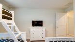 Bedroom 4 with chest of drawers and LCD cable TV from Champions Gate rental Townhouse direct from owner