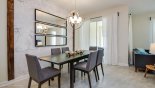 Ample seating around large dining room table should you need a break from the sun with this Orlando Townhouse for rent direct from owner
