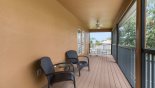 Private balcony off master 1 bedroom with 2 rocking chairs outside master 2 bedroom from Nottingham 1 Villa for rent in Orlando