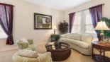 Front living room with comfortable seating with this Orlando Villa for rent direct from owner