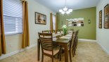 Attractively decorated dining room off kitchen - www.iwantavilla.com is the best in Orlando vacation Villa rentals