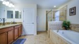 Master 1 ensuite bathroom with Roman bath, his & hers sinks, large walk-in shower & separate WC from Fiji 7 Villa for rent in Orlando