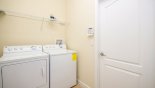 Laundry room with washer & dryer so no need to pack too many clothes from Fiji 7 Villa for rent in Orlando