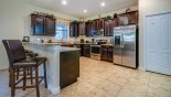 Fully fitted kitchen with quality appliances and granite counter tops with this Orlando Villa for rent direct from owner