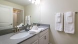 Family bathroom #2 with large walk-in shower, his & hers sinks & WC from Beach Palm 10 Villa for rent in Orlando