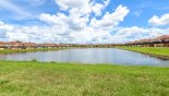View of pond to rear of property with this Orlando Villa for rent direct from owner
