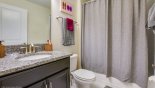 Villa rentals in Orlando, check out the Family Bathroom 3 with single sink, WC & shower over bath