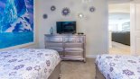 Villa rentals near Disney direct with owner, check out the Bedroom 4 with chest of drawers and LCD cable TV above
