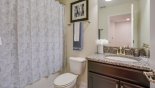 Spacious rental Solterra Resort Villa in Orlando complete with stunning Family Bathroom 4 with single sink, WC & shower over bath