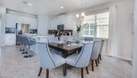 Villa rentals in Orlando, check out the Dining room table is conveniently located adjacent to kitchen area