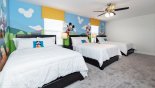 Bedroom 9 with 3 x full=sized beds and Disney decor - perfect for kids sharing a room with this Orlando Villa for rent direct from owner