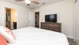 Villa rentals in Orlando, check out the Bedroom 5 with chest of drawers & Smart TV above