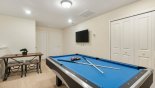 Entertainment loft with pool table & wall mounted LCD cable TV from Castaway 1 Townhouse for rent in Orlando