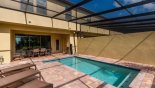 Spacious rental Solterra Resort Townhouse in Orlando complete with stunning Pool viewed towards covered lanai