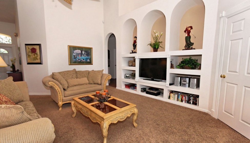 Family room with flat screen TV, DVD, CD stereo