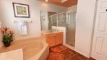 Master 1 ensuite with corner bathtub, large walk-in shower and twin sinks from Highlands Reserve rental Villa direct from owner