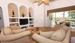 Family room with direct access to pool deck with this Orlando Villa for rent direct from owner