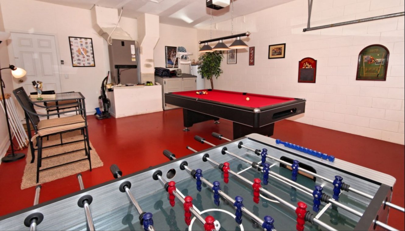 Games room with pool table and table football