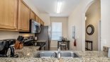 View of kitchen towards breakfast nook with this Orlando Townhouse for rent direct from owner