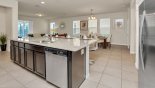 Villa rentals in Orlando, check out the Kitchen island unit incorporating built-in dishwasher & double sink with waste disposal
