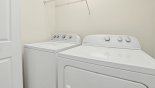 Orlando Villa for rent direct from owner, check out the Laundry facility at top of stairs with full-size washer & dryer
