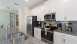 Spacious rental Champions Gate Townhouse in Orlando complete with stunning Fully fitted kitchen with quality appliances and granite counter tops