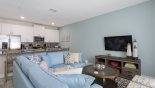 Living room with wall mounted LCD cable TV from Beach Palm 12 Townhouse for rent in Orlando