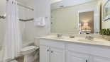Family bathroom #4 with bath & shower over - www.iwantavilla.com is the best in Orlando vacation Villa rentals