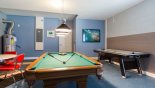 Spacious rental Solterra Resort Villa in Orlando complete with stunning Games room with pool table, air hockey,  table foosball & wall mounted LCD cable TV