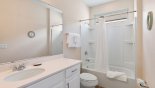 Family bathroom #5 with bath & shower over from Malibu 1 Villa for rent in Orlando