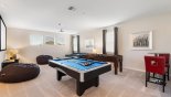Loft entertainment space with pool table & table foosball - www.iwantavilla.com is your first choice of Villa rentals in Orlando direct with owner