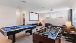 Villa rentals near Disney direct with owner, check out the View of loft entertainment space with games room and home cinema