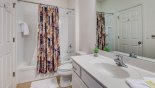 Jack & Jill bathroom #4 with bath & shower over - www.iwantavilla.com is the best in Orlando vacation Villa rentals