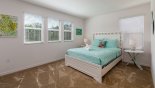 Spacious rental Watersong Resort Villa in Orlando complete with stunning Master bedroom #2 with queen sized bed
