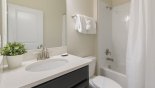 Family bathroom #5 with bath & shower over from Champions Gate rental Villa direct from owner