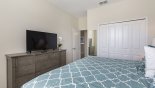 Bedroom #5 with LCD cable TV with this Orlando Villa for rent direct from owner