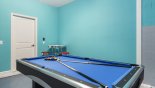Games room with pool table & table foosball - www.iwantavilla.com is the best in Orlando vacation Villa rentals