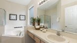 Villa rentals in Orlando, check out the Ensuite bathroom #1 with Roman bath, walk-in shower, single vanity & separate WC