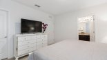 Master suite #2 with LCD cable TV with this Orlando Villa for rent direct from owner