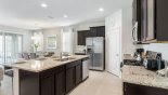 Villa rentals in Orlando, check out the Fully fitted kitchen with quality appliances and granite counter tops
