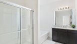 Spacious rental Solterra Resort Villa in Orlando complete with stunning Master #1 ensuite bathroom with walk-in shower & Roman bath