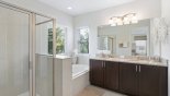 Crestview 7 Villa rental near Disney with Master #1 ensuite bathroom with Roman bath, walk-in shower, dual vanities & separate WC