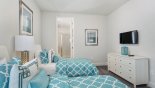 Villa rentals in Orlando, check out the Bedroom #4 with wall mounted LCD cable TV
