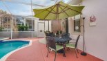 Villa rentals in Orlando, check out the Patio wrought iron dining set with 4 chairs and parasol
