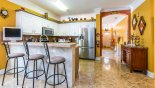 Villa rentals near Disney direct with owner, check out the Breakfast bar with 3 bar stools & LCD cable TV