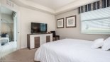Master bedroom with views onto landscaping to rear - www.iwantavilla.com is the best in Orlando vacation Villa rentals