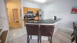Kitchen breakfast bar with 2 bar stools - www.iwantavilla.com is the best in Orlando vacation Townhouse rentals